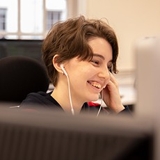 Developer smiling at work