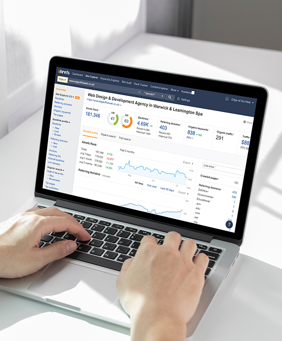 A laptop using ahrefs to show website performance