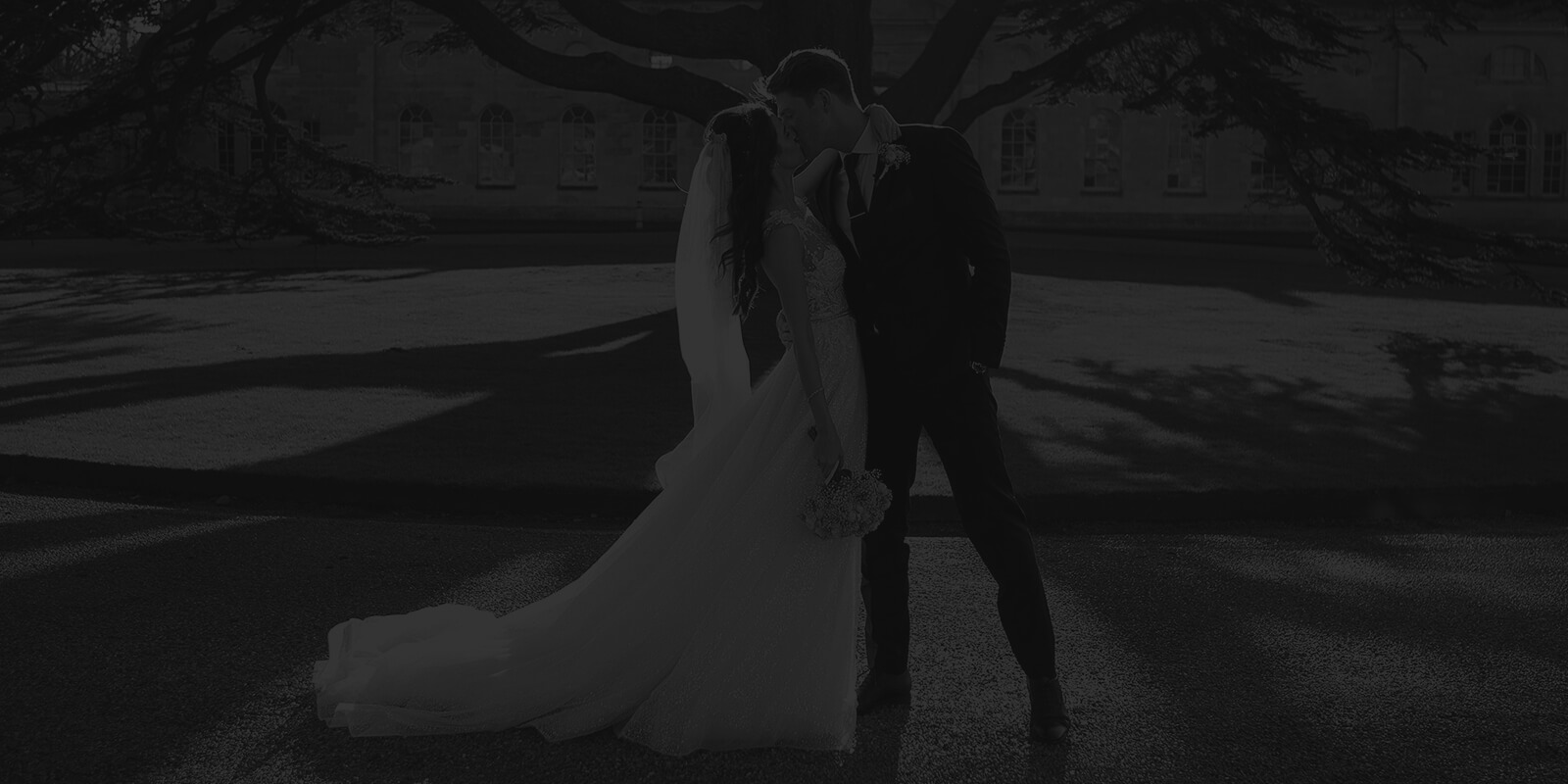 Bride and groom kissing on their wedding day