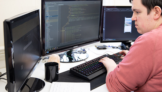 Person working on a document on a screen