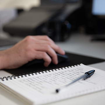 A close up photo of a list of tasks on a notepad