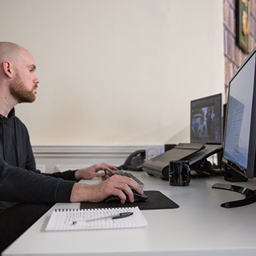 Creative manager working at his desk in photoshop
