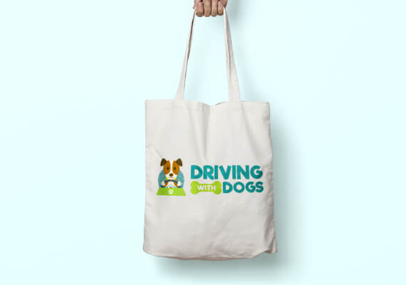 Driving with Dogs logo on a tote bag