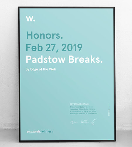 Framed award poster from awwwards for the Padstow Breaks website