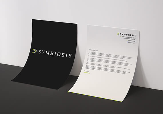 Symbiosis logo on paper and a letterhead