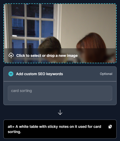 Screenshot of the results of running an image of two women card sorting through an AI alt text generator