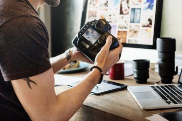 Photographer choosing photos