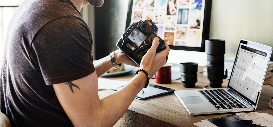 Photographer choosing photos
